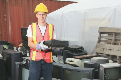 Customer service team assisting with skip hire