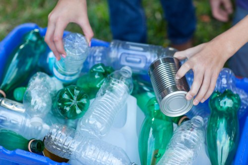 Workers managing construction waste safely